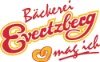 Evertzberg Bäckerei-Logo mit gelbem Retro-Emblem, rotem Schriftzug und Herz
